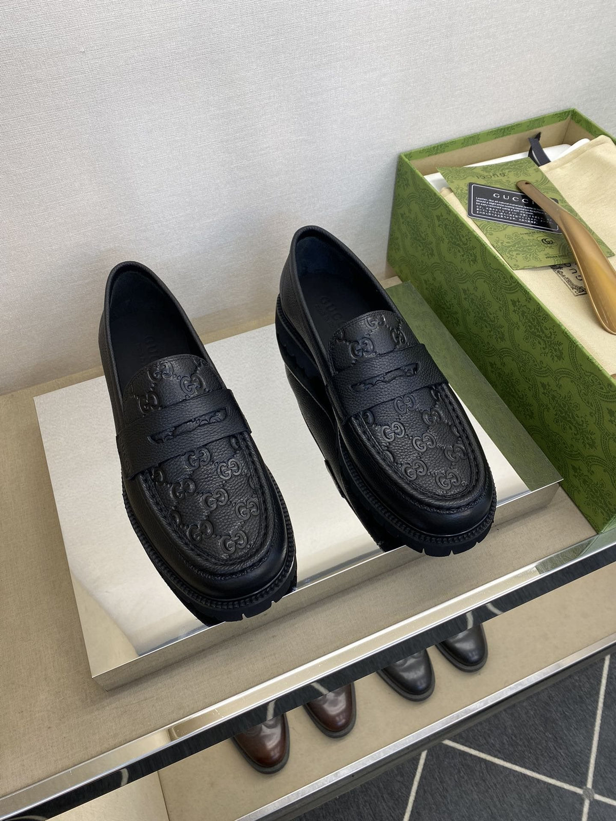 Gucci Men's Black Embossed Lug Sole Loafers